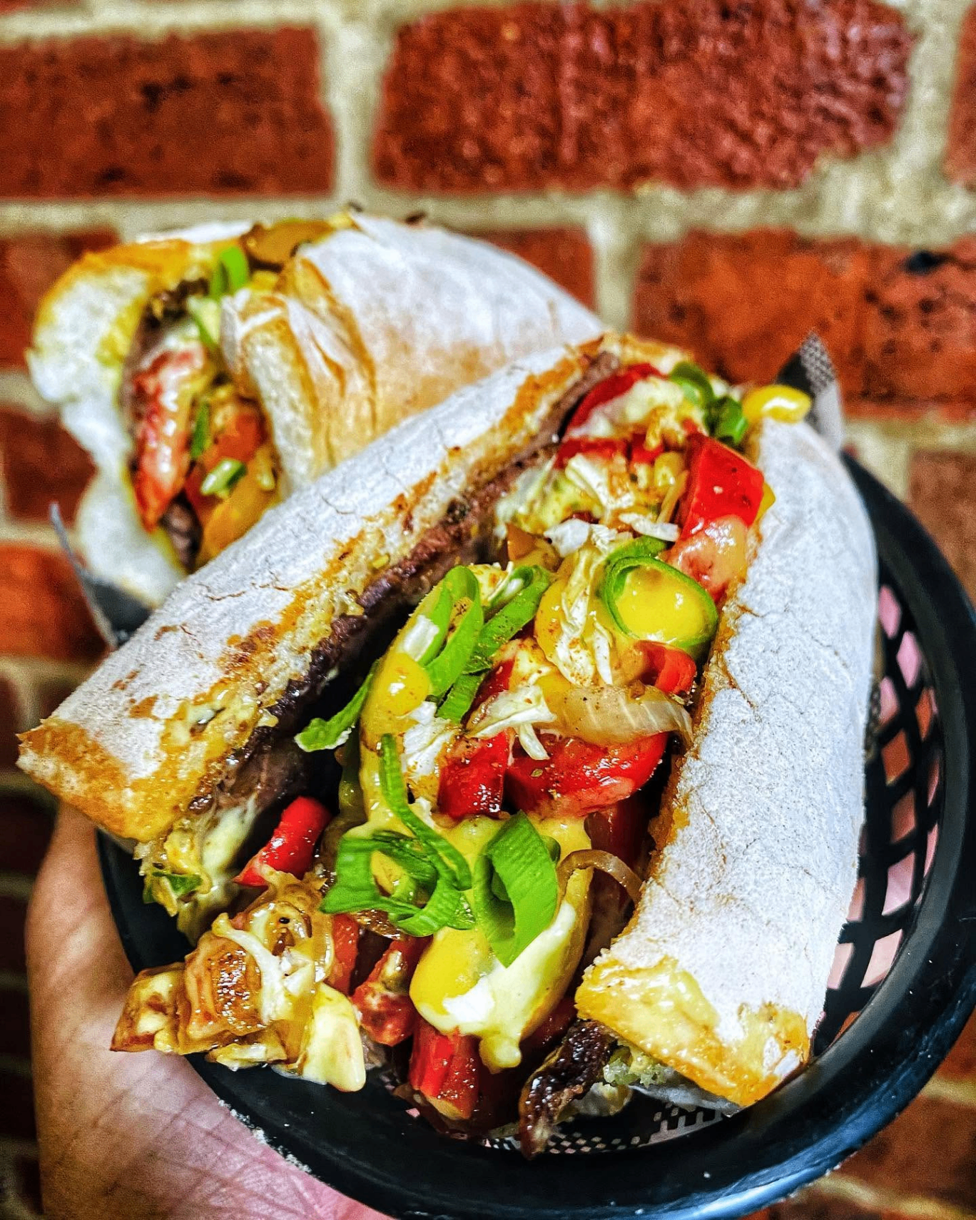 Premium loaded sub sandwich with smoked meats and fresh toppings